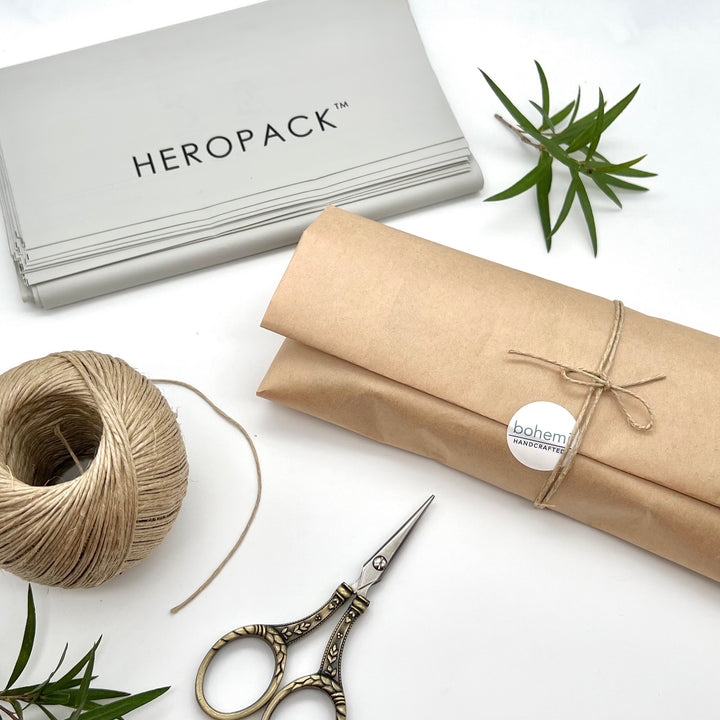 bohemi packaging, eco friendly kraft paper, hemp twine, biodegradable mailers text hero pack scissors and leaf